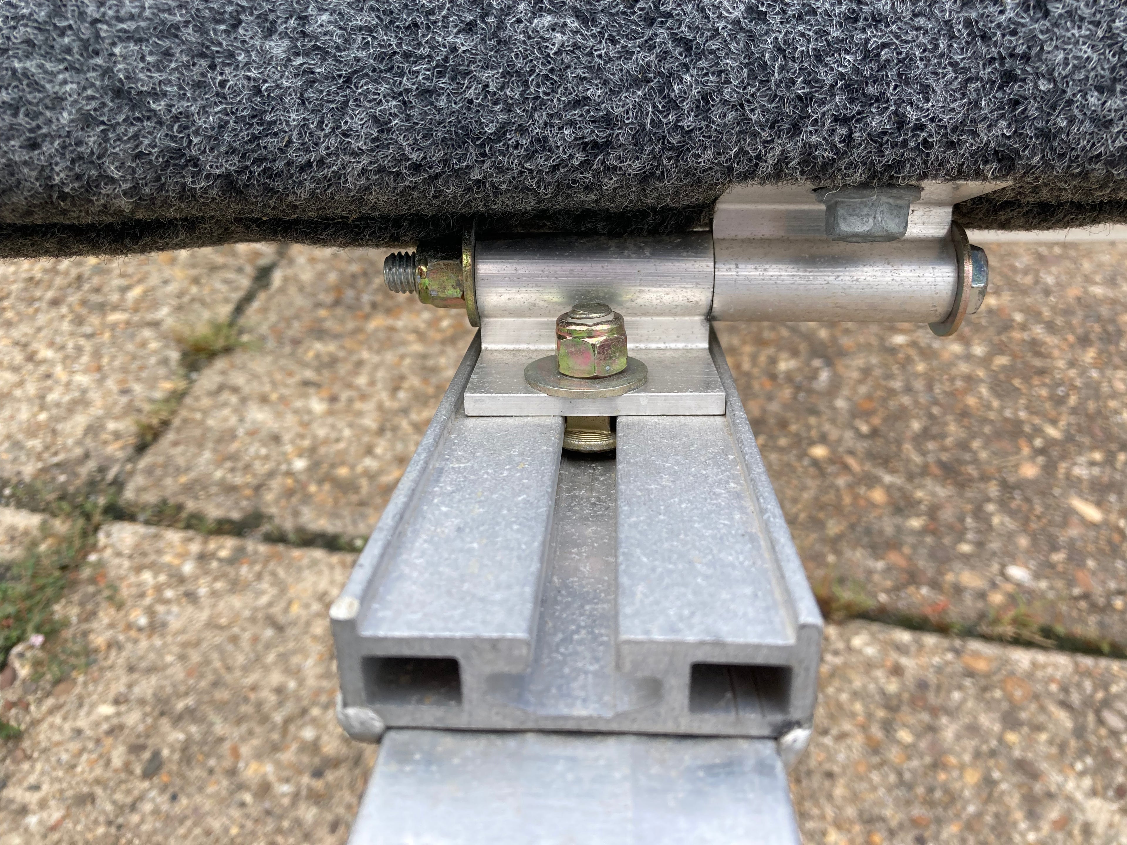 Stainless steel spacer kit for low profile attachment bracket