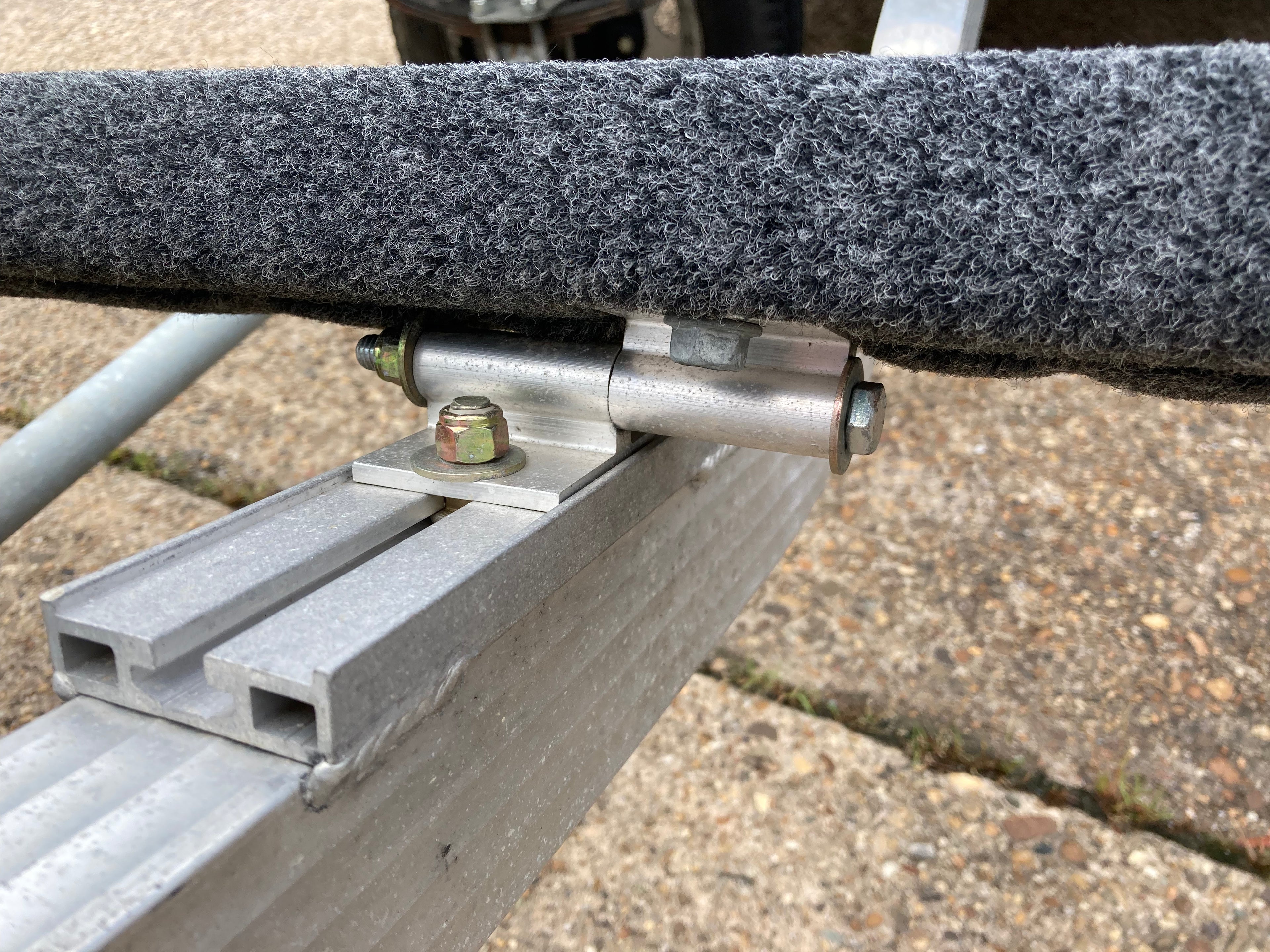 Stainless steel spacer kit for low profile attachment bracket